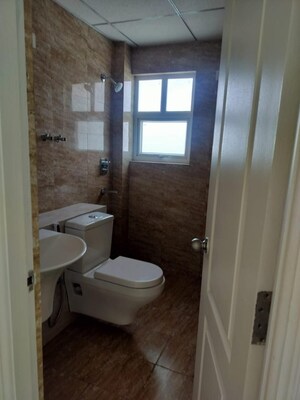 Bathroom in 2 BHK Apartment at Uninav Heights Phase I, Raj Nagar Extension – for Sale