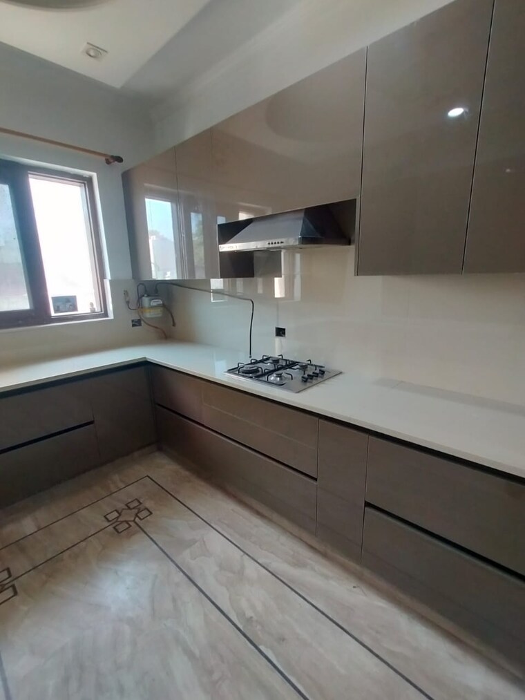 Kitchen, panchsheel park 4 Bedroom 500 Sq.Yd. Builder Floor In Panchsheel Park Delhi 9093592