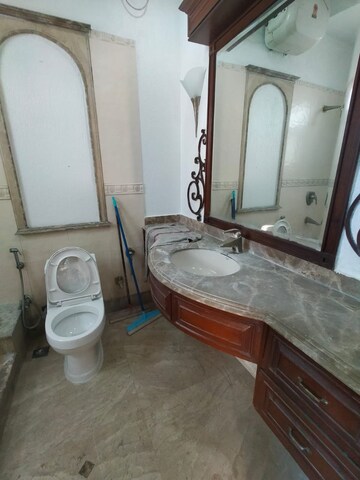 Bathroom in 4 BHK Builder Floor at Panchsheel Park – for Sale