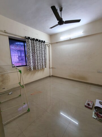 Room in 2 BHK Apartment at Neelam Apartment Sector 21, Nerul – for Rent
