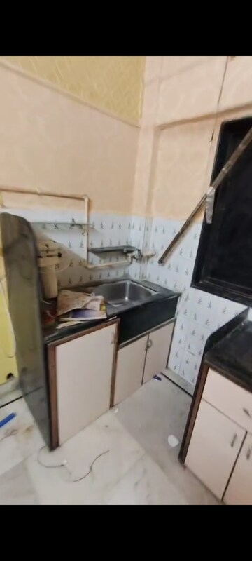 Kitchen in 2 BHK Apartment at Jumbo Darshan, Andheri East – for Rent