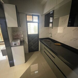 Kitchen in 1 BHK Apartment at Shree Sai D N Nagar Shivneri CHS Ltd, Sv Patel Nagar – for Sale