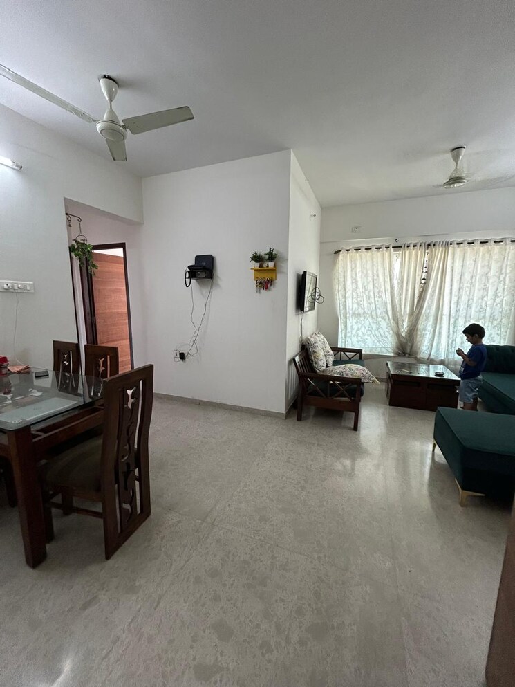 Living Room, romell-aether 2 Bedroom 750 Sq.Ft. Apartment In Goregaon East Mumbai 9093711