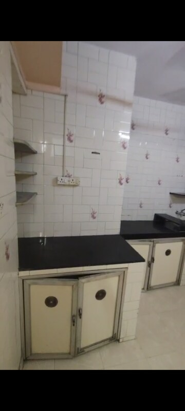 Kitchen in 1 BHK Apartment at Marzban CHS, Vile Parle East – for Rent