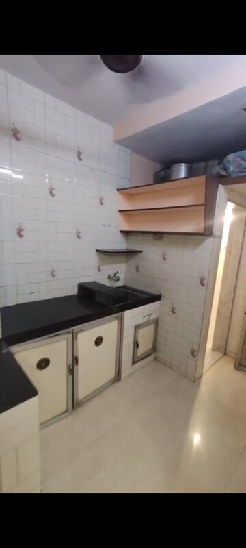 Kitchen in 1 BHK Apartment at Marzban CHS, Vile Parle East – for Rent