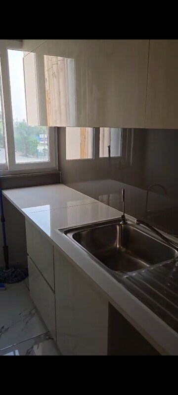 Kitchen in 2.5 BHK Builder Floor at Central Park Cerise Suites, Sohna Sector 33 – for Rent