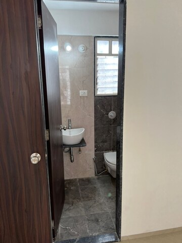 Bathroom in 2 BHK Apartment at Kuber Imperia, Wakad – for Rent