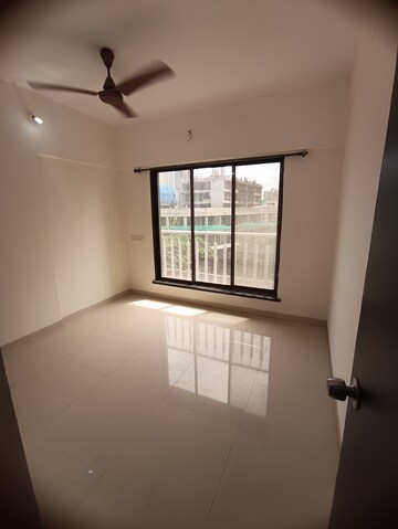 Bedroom in 2 BHK Apartment at Ninaad CHS, Malad West – for Rent