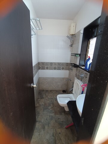 Bathroom in 2 BHK Apartment at Ninaad CHS, Malad West – for Rent