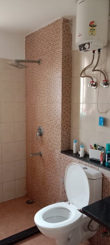 Bathroom in 3 BHK Apartment at Unitech The Residences Sector 33, Sector 33 – for Rent