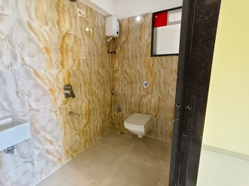 Bathroom in 2 BHK Apartment at Lotus Lotus Link Square, Malad West – for Rent