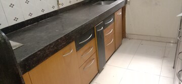 Kitchen in 2 BHK Apartment at Riddhi Garden, Malad East – for Rent