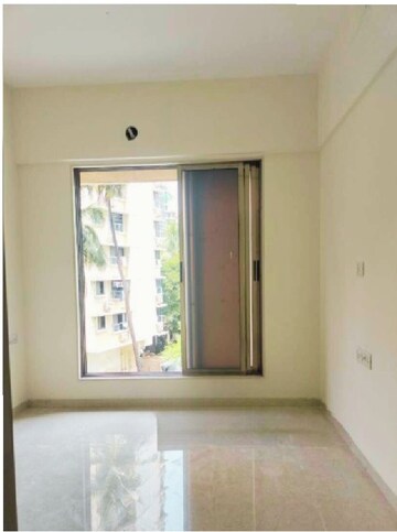 Bedroom in 3 BHK Apartment at Vardhman Grandeur, Andheri West – for Rent
