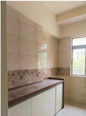 Kitchen in 3 BHK Apartment at Vardhman Grandeur, Andheri West – for Rent