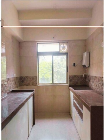 Kitchen in 3 BHK Apartment at Vardhman Grandeur, Andheri West – for Rent