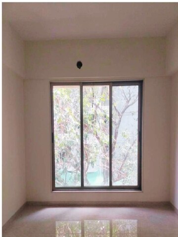 Bedroom in 3 BHK Apartment at Vardhman Grandeur, Andheri West – for Rent