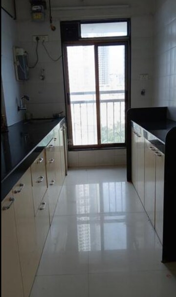 Kitchen in 2 BHK Apartment at Mayfair Legends, Malad West – for Rent