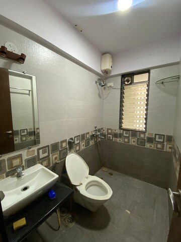 Bathroom in 2 BHK Apartment at Mayfair Legends, Malad West – for Rent