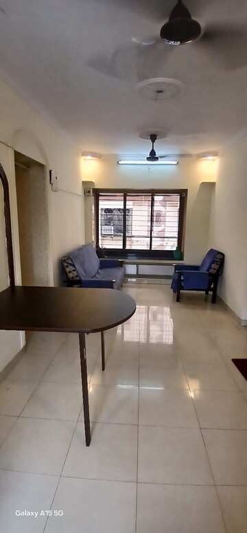 Living Room in 1.5 BHK Apartment at Andheri West – for Rent