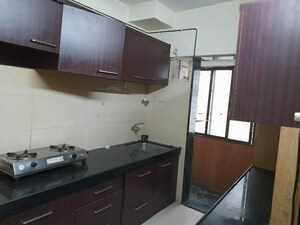 Kitchen in 2 BHK Apartment at Janki Niwas Malad, Malad East – for Sale