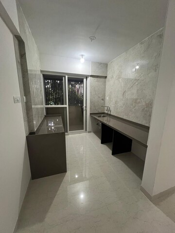 Kitchen in 3 BHK Apartment at Nirman Adi, Kalyani Nagar – for Rent