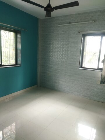 Room in 1 BHK Apartment at Pranam CHS Borivalli West, Borivali West – for Sale