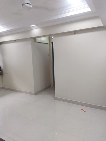 Room in 1 BHK Apartment at Pranam CHS Borivalli West, Borivali West – for Sale
