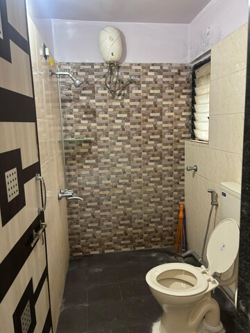 Bathroom in 1 BHK Apartment at Lotus Urban Hills, Shilphata – for Sale