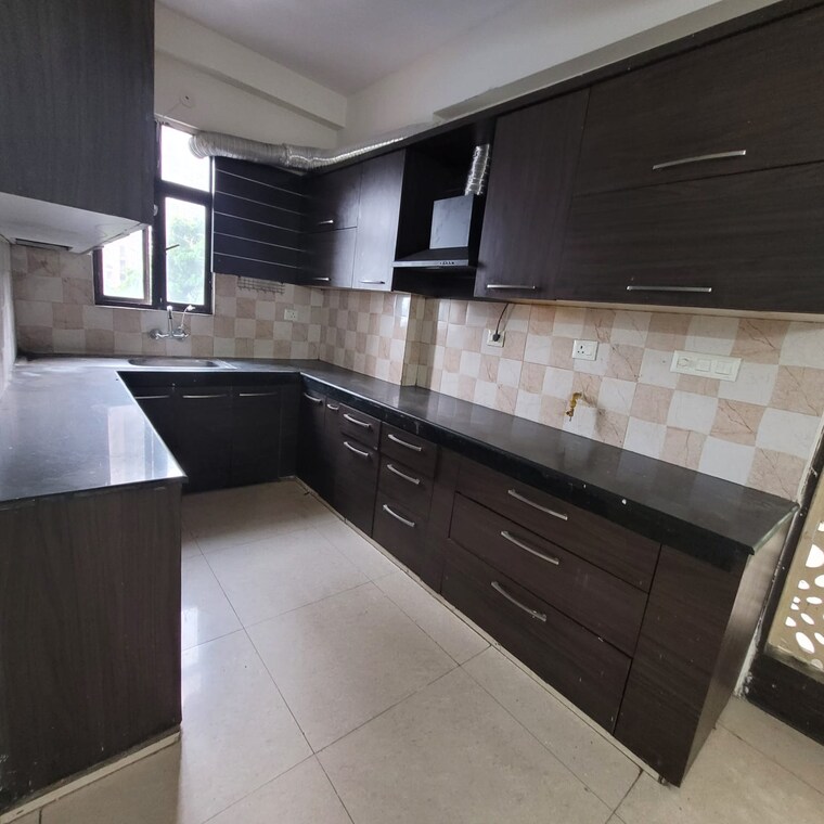 Kitchen, crossing-republik 2 Bedroom 1100 Sq.Ft. Apartment In Crossing Republic Ghaziabad 9094288