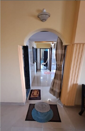 Living Room in 2 BHK Apartment at Dhanlaxmi CHS Asalpha, Asalpha – for Rent