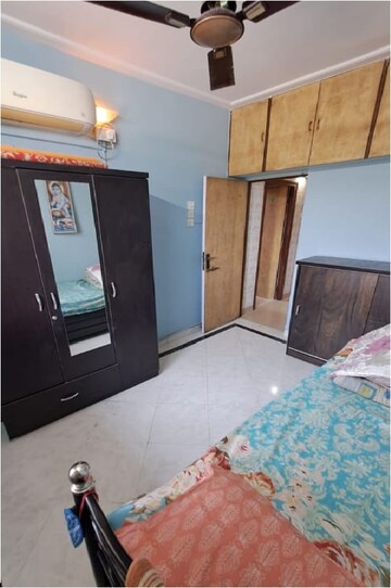 Bedroom in 2 BHK Apartment at Dhanlaxmi CHS Asalpha, Asalpha – for Rent