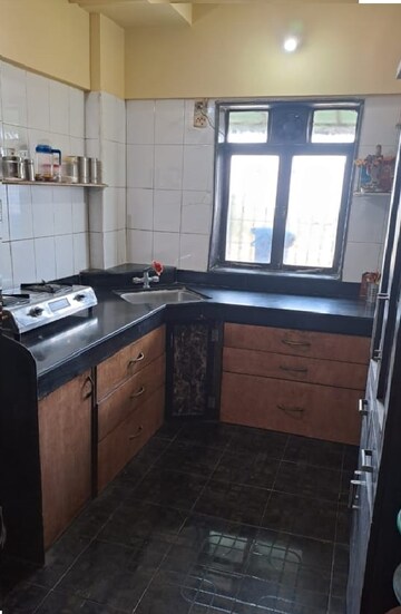 Kitchen in 2 BHK Apartment at Dhanlaxmi CHS Asalpha, Asalpha – for Rent