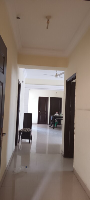 Living Room in 4 BHK Apartment at Ramprastha Coral Heights, Ramprastha Greens – for Sale