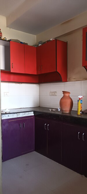 Kitchen in 4 BHK Apartment at Ramprastha Coral Heights, Ramprastha Greens – for Sale