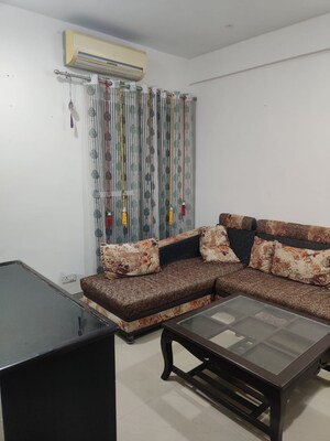 Living Room in 2 BHK Apartment at Galaxy Royale, Gaur City 2 – for Sale