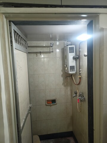 Bathroom in 1 BHK Apartment at Adarsh Nagar Society, Worli – for Rent