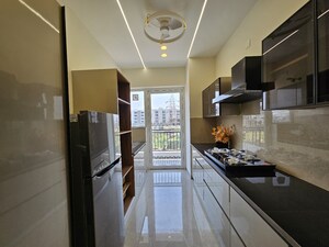 Kitchen in 4 BHK Apartment at Exotic Grandeur, Baltana – for Sale