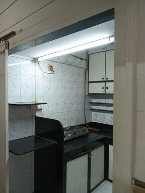 Kitchen in 2 BHK Apartment at Himgiri Lokupvan Phase II CHS Ltd, Vasant Vihar – for Sale