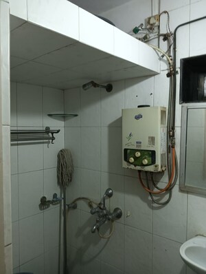 Bathroom in 2 BHK Apartment at Himgiri Lokupvan Phase II CHS Ltd, Vasant Vihar – for Sale