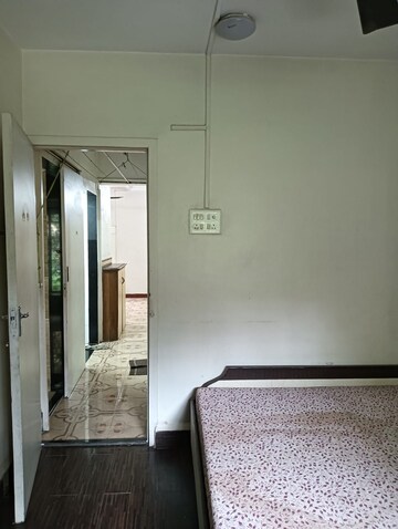 Room in 2 BHK Apartment at Himgiri Lokupvan Phase II CHS Ltd, Vasant Vihar – for Sale