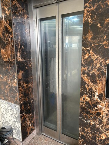 Building Lobby in 3 BHK Builder Floor at Laxman Vihar Phase 2 – for Sale