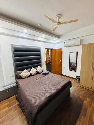 Bedroom in 1 BHK Apartment at Nimbus The Golden Palm, Sector 168 – for Rent