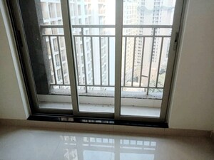 Room in 2 BHK Apartment at Ashar Metro Towers, Vartak Nagar – for Sale