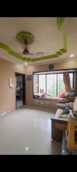 Living Room in 1 BHK Apartment at Raunak Park View, Ghodbunder Road – for Sale