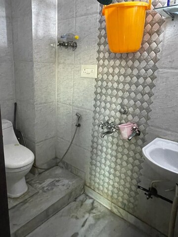 Bathroom in 1 RK Independent House at RWA Apartments Sector 19, Sector 19 – for Rent