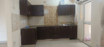 Kitchen in 3 BHK Apartment at Aims Golf City, Sector 75 – for Rent