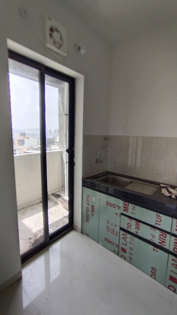 Kitchen in 2 BHK Apartment at Shapoorji Pallonji Sensorium, Hinjewadi – for Rent
