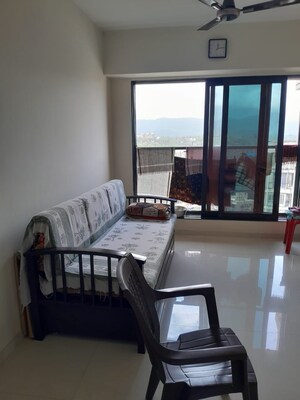 Living Room in 2 BHK Apartment at Pranav Flora Enclave, Borivali East – for Sale