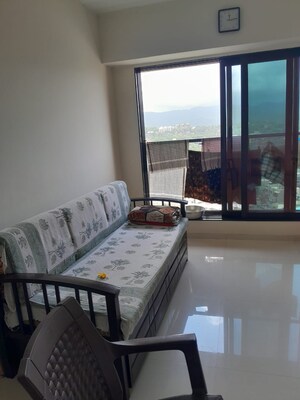 Living Room in 2 BHK Apartment at Pranav Flora Enclave, Borivali East – for Sale