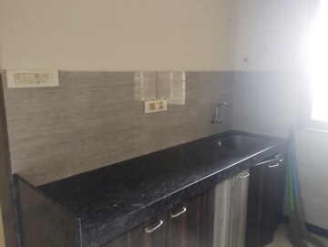 Kitchen in 2 BHK Apartment at Acme Ozone, Manpada – for Rent